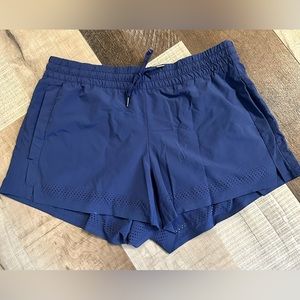 Athleta Blue Baja Lined Laser Cut Shorts
